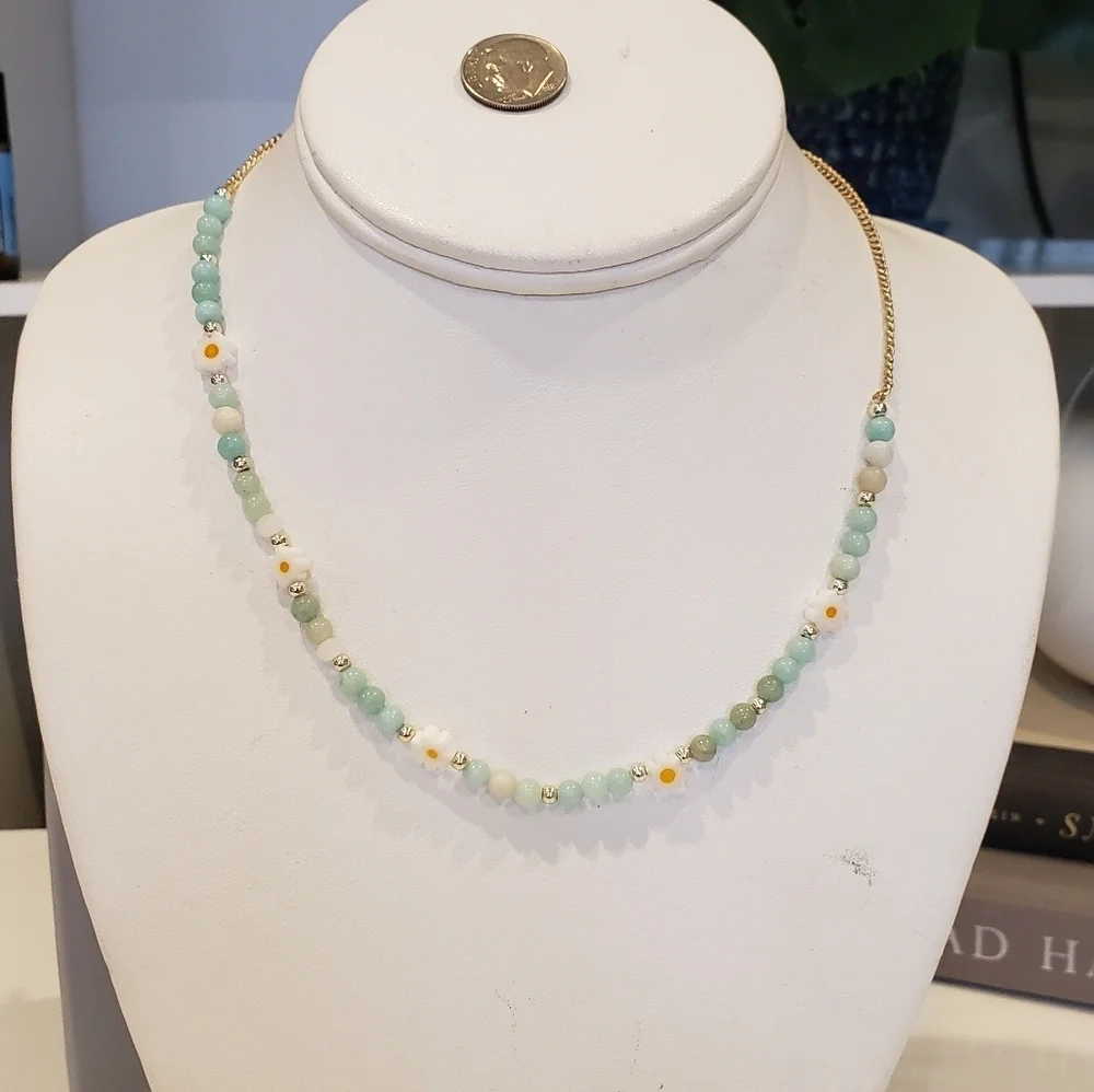 Elegant Beaded Necklace with Floral Accents